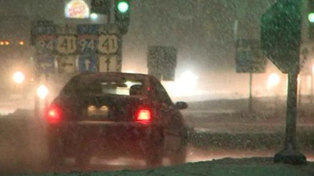 Snowy evening makes driving a challenge in Racine