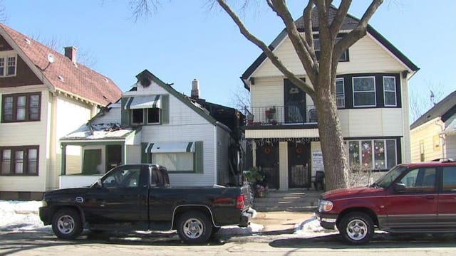 Firefighters called out to house fire near 11th and North that spread to adjoining building