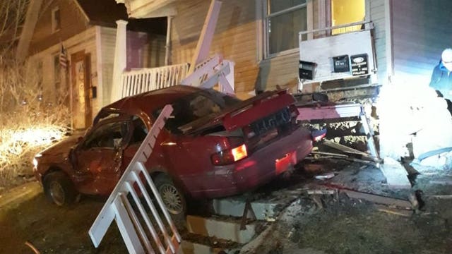 Police: 17-year-old was 'racing' before crashing into porch on Milwaukee's south side