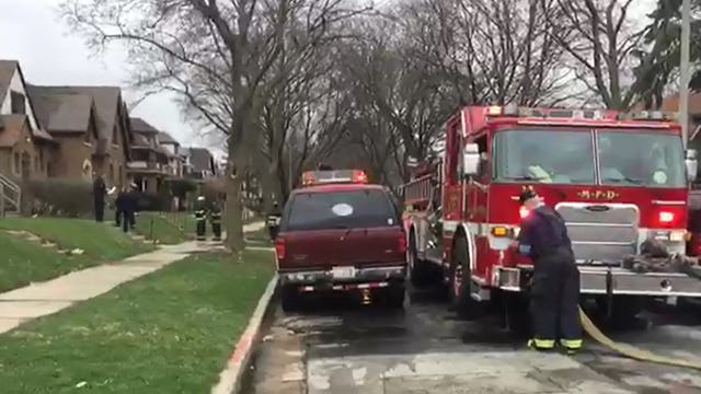 Developing: Woman rescued from burning home near 48th and Center