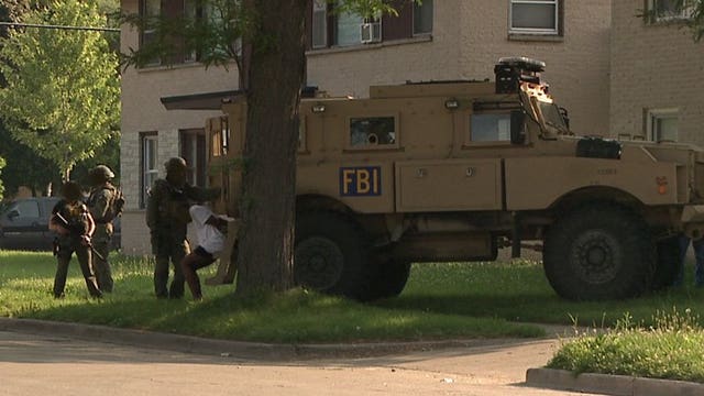 Attack against violent gangs: FBI, Milwaukee police team up for early morning raid