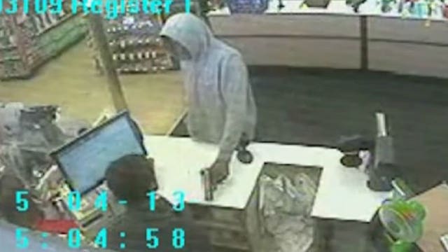 Surveillance footage captures Teutonia Ave Walgreens robbery, can you help identify the suspect?