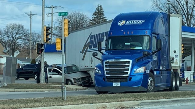 Police respond to crash involving semi near 20th and Howard in Milwaukee