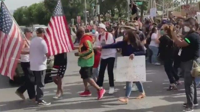 Man arrested after pulling rifle on Black Lives Matter protesters in California