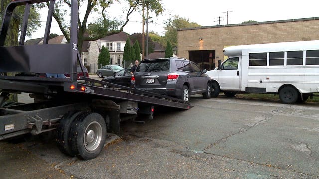Carjacking suspect jumps out of rolling SUV; vehicle crashes into day care bus