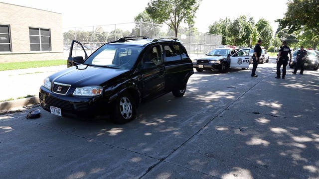 Three suspects in custody after three armed robberies & pursuit; two officers injured