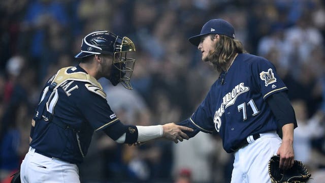 After getting blanked the night before, Brewers outlast Reds in thriller 11-9