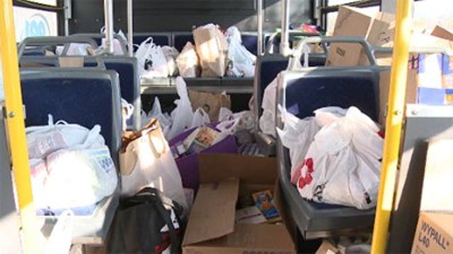 Hundreds turn out to Stuff the Bus and help tackle hunger