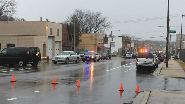 Police: 25-year-old man shot while seated in car, search on for suspects