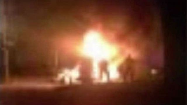 Arrested: Driver of striking vehicle could soon be charged after fiery, fatal crash