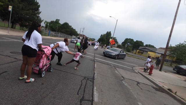 'Oh my God!' Reckless driver barreled through crowd gathered for anti-violence rally