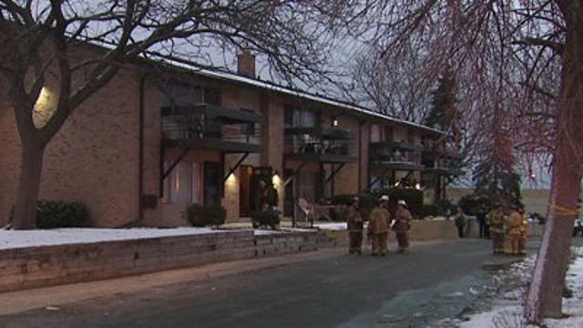 Fire officials battle blaze in townhouse near 20th and Layton