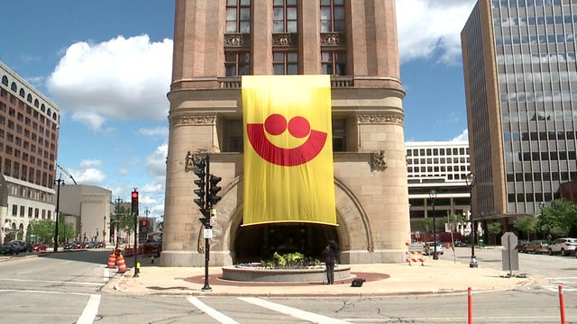 Ahead of Summerfest's 50th edition, giant flag goes up at Milwaukee's City Hall