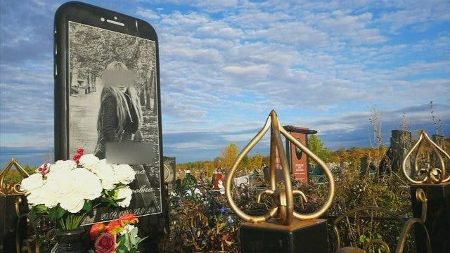 Family marks daughter's grave with iPhone-shaped stone