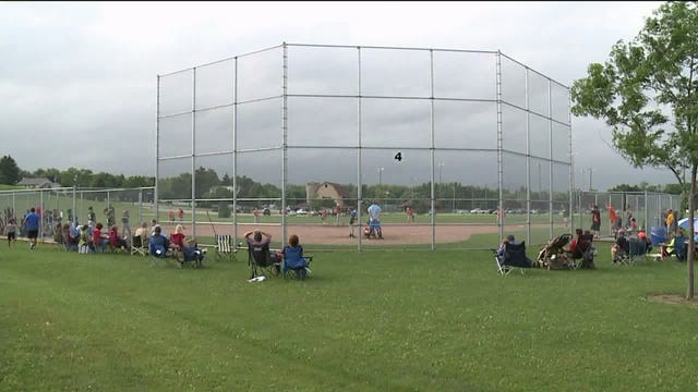 "They really love playing:" Parents pleased storms stayed away Monday night so kids could play ball