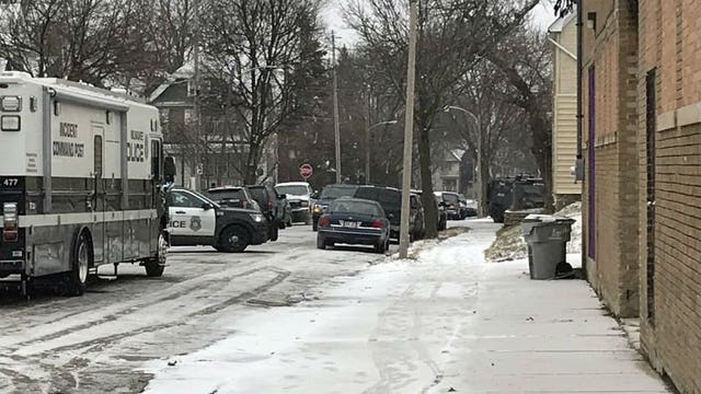 Police: Armed suspect taken into custody after initially refusing to exit home