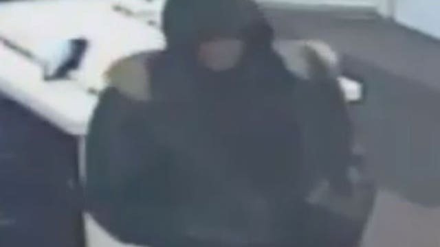 Police seek suspect caught on camera robbing Metro PCS near Layton and Greenfield