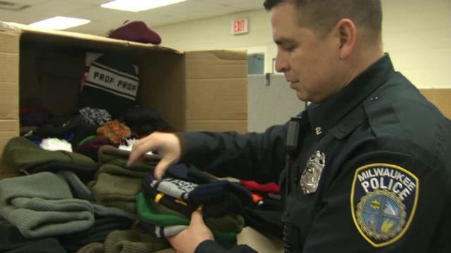 Giving the gift of warmth: Girl & her father team up to donate hats to Milwaukee police for distribution