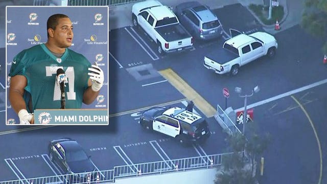Ex-NFL player in custody after gun photo threatens former teammates, school