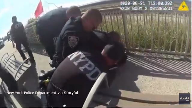 NYPD officer suspended after he was caught on video using banned chokehold is charged