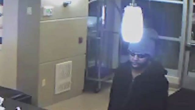 Caught on camera: Armed suspect jumps over counter in attempted robbery at Days Inn