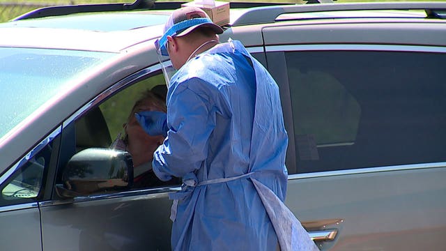 'A hot mess:' Americans face testing delays as COVID-19 surges