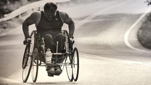 Paralyzed Marine walks for the first time in 33 years