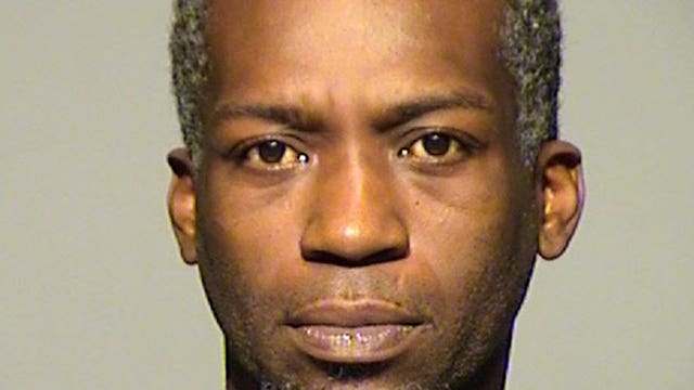 44-year-old convicted felon charged, accused of pointing gun at Milwaukee police officers