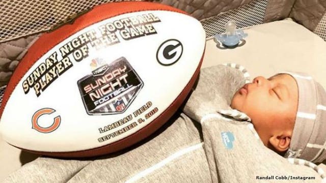 Packers' wide receiver Randall Cobb celebrates big win with newborn son