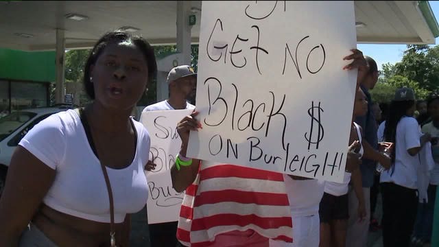 Protesters urge boycott of BP gas station near Sherman Park after shots fired incident