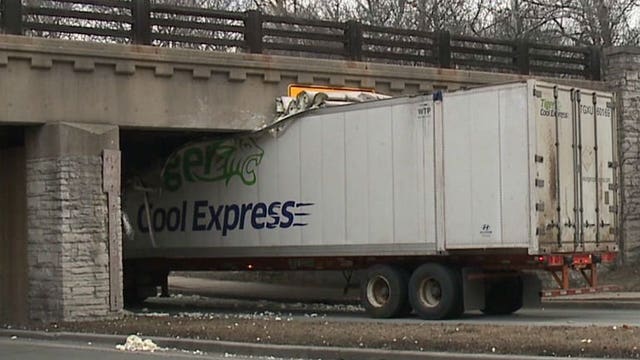 Semi suffers damage after hitting railroad bridge on Swan Boulevard in Wauwatosa