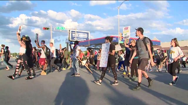 Protests continue for 14th straight day; group marches from McGovern Park into Brown Deer