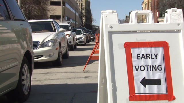 'I had to go do this:' Some waited 2 hours on final day of drive-thru voting in Milwaukee