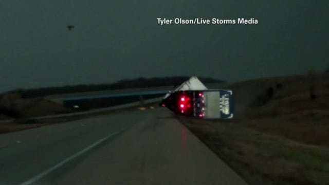 Watch: Incredible video shows semi truck blown over during storm in Illinois
