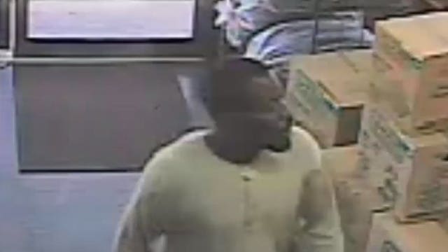 Caught on camera: Employee robbed at gunpoint inside U-Haul Moving & Storage