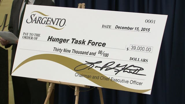"Touchdowns for Charity:" Sargento presents $39K check to Hunger Task Force