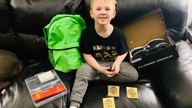 Kenosha detective surprised 5-year-old boy with stickers, new shoes, backpack with school supplies