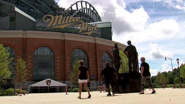 'We have to back them:' With Brewers' home opener postponed, fans express concern, support