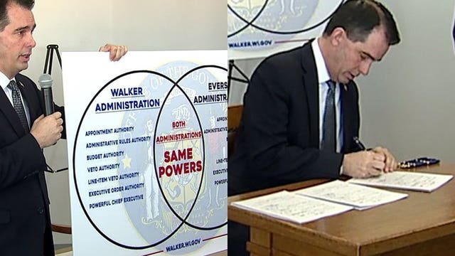 Governor Scott Walker signs sweeping lame-duck GOP bills