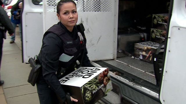 Milwaukee police pitch in to help "real people with real needs" this holiday season