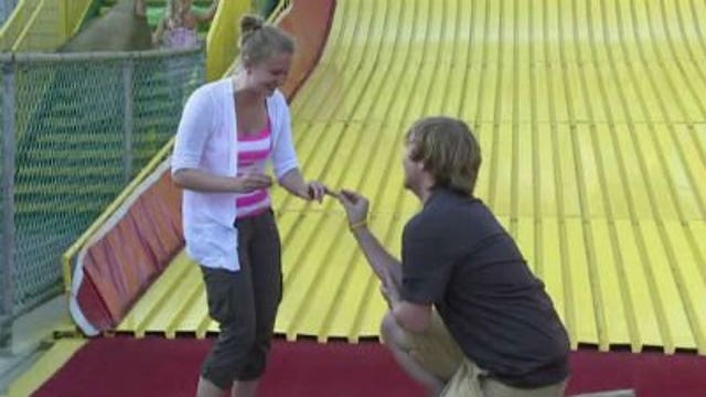 Couple gets engaged at Giant Slide on 5 year anniversary of 1st date