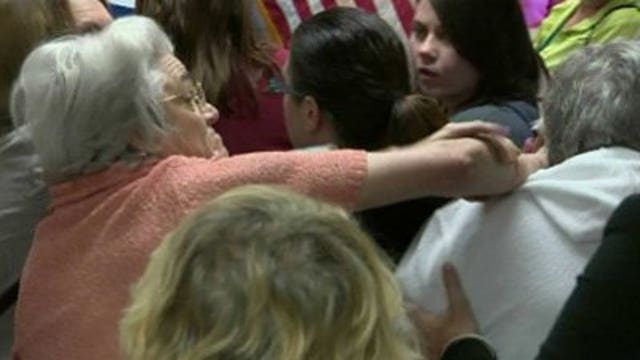 Protester spits on Romney supporter at Wisconsin event