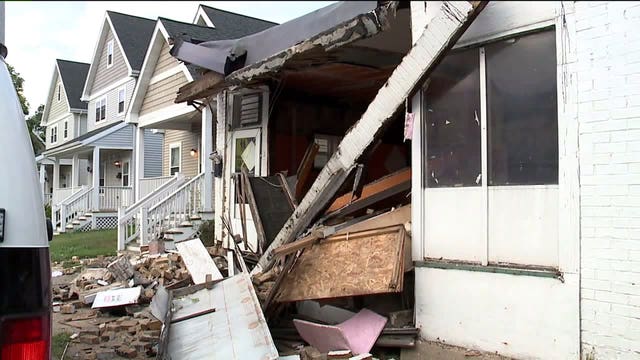 'I don't know what to do:' Driver arrested for possible OWI after crashing into building