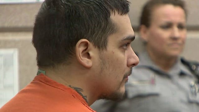 Headed for trial: Alfonso Martinez, accused of threatening officers with knife, killing father & uncle