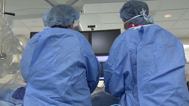 Hotels become barracks for health workers 'going to war' against COVID-19