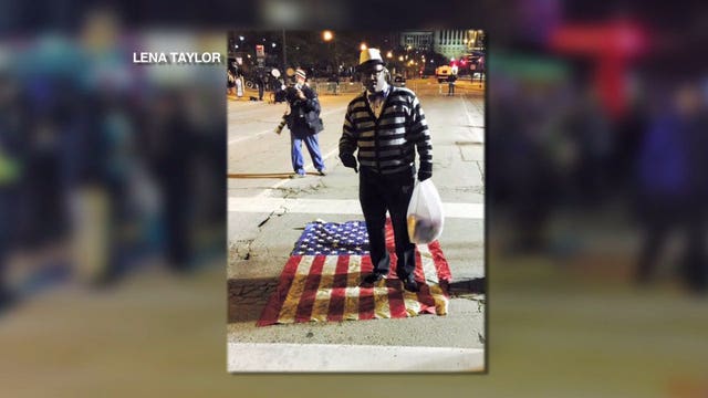 Accused of burning flag during protest, man admits to prior arson conviction, denies he lit up flag