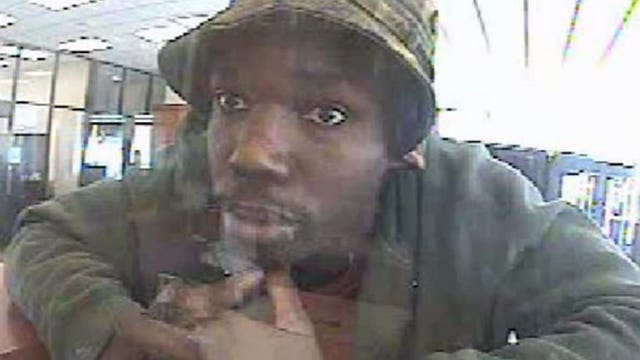 Very clear surveillance video! Can you help police solve this bank robbery?