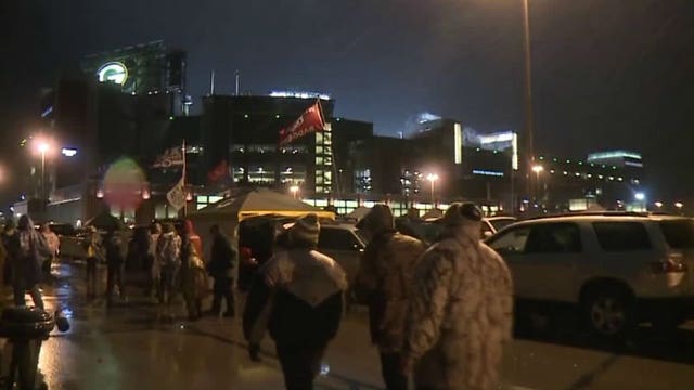 Wet, soggy Thanksgiving Day weather was no match for die-hard Packers fans