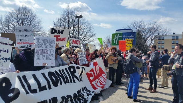 Dozens protest outside Trump event in Janesville: "We don't stand for what he believes in"