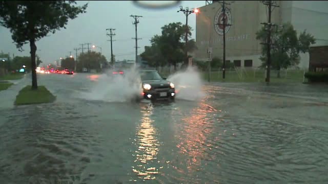 "Pouring like crazy:" Heavy rain led to street flooding in Milwaukee area; and it happened fast